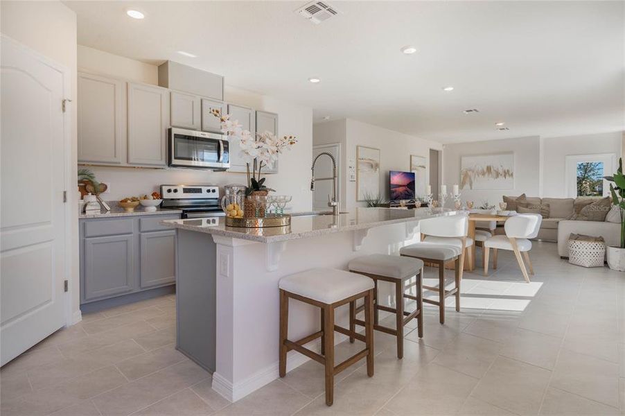 Furnished interior view inside a new home in Lake Deer Estates, Poinciana (Image 9).