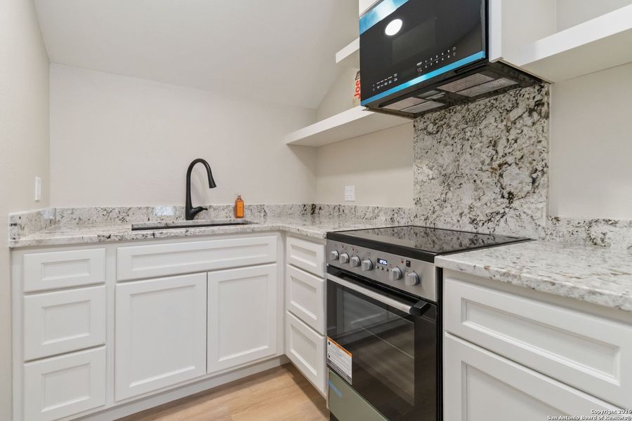 Furnished interior view inside a new home in , Boerne (Image 39).
