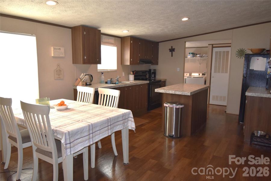 Furnished interior view inside a new home in , Lenoir (Image 25).