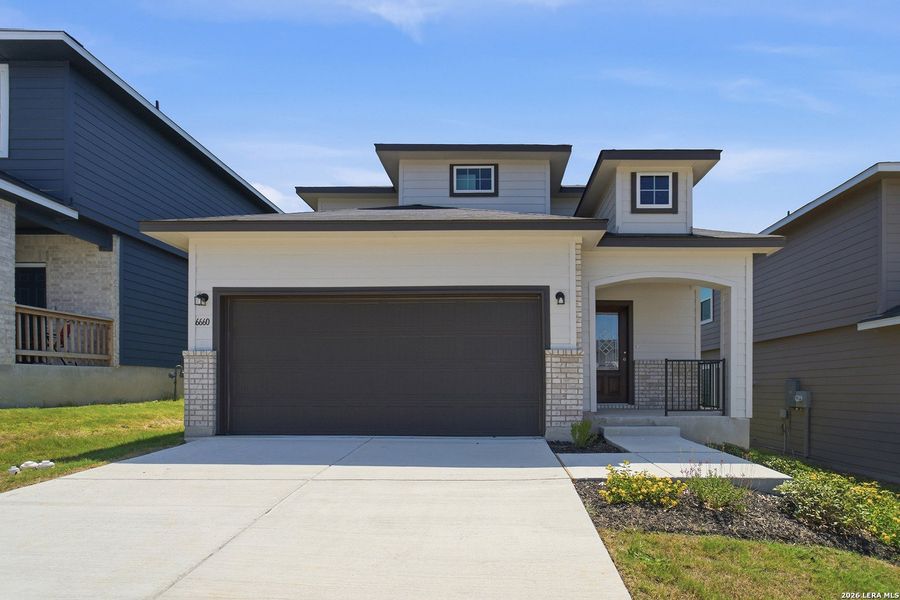 Front exterior of a new home in Willow View, Converse, TX, highlighting curb appeal (Image 1). Front exterior of a new home in Willow View, Converse, TX, highlighting curb appeal (Image 1).