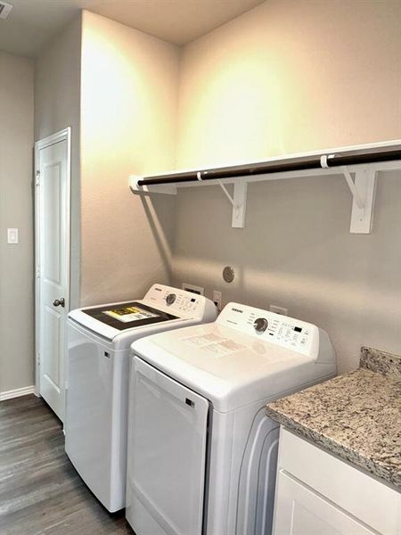 Granite folding counter, broom closet & the washer/dryer are included!