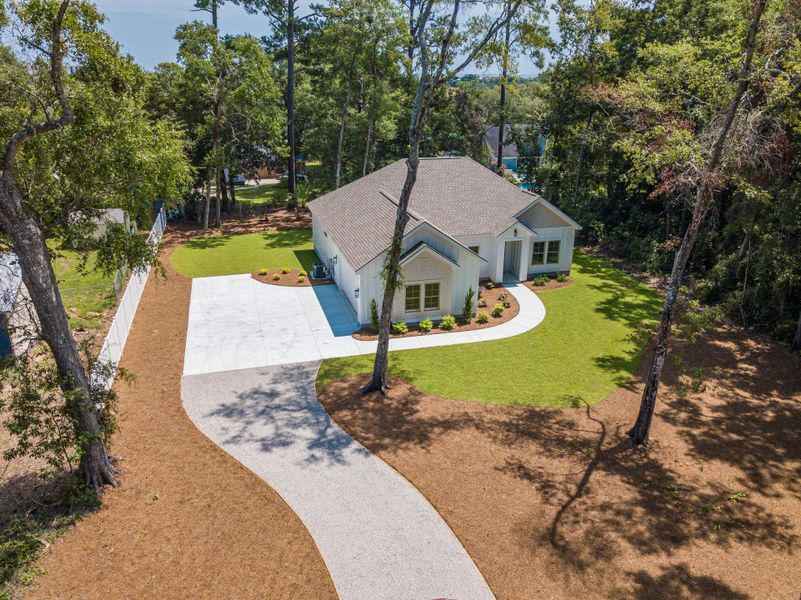 Front exterior of a new home in , Pawleys Island, SC, highlighting curb appeal (Image 18). Front exterior of a new home in , Pawleys Island, SC, highlighting curb appeal (Image 18).