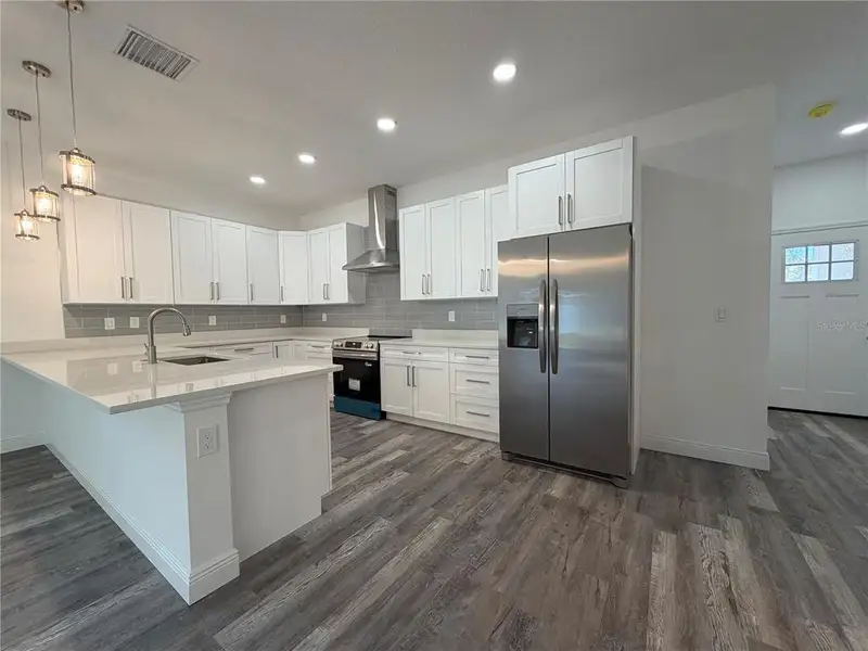 Furnished interior view inside a new home in , Daytona Beach (Image 5).