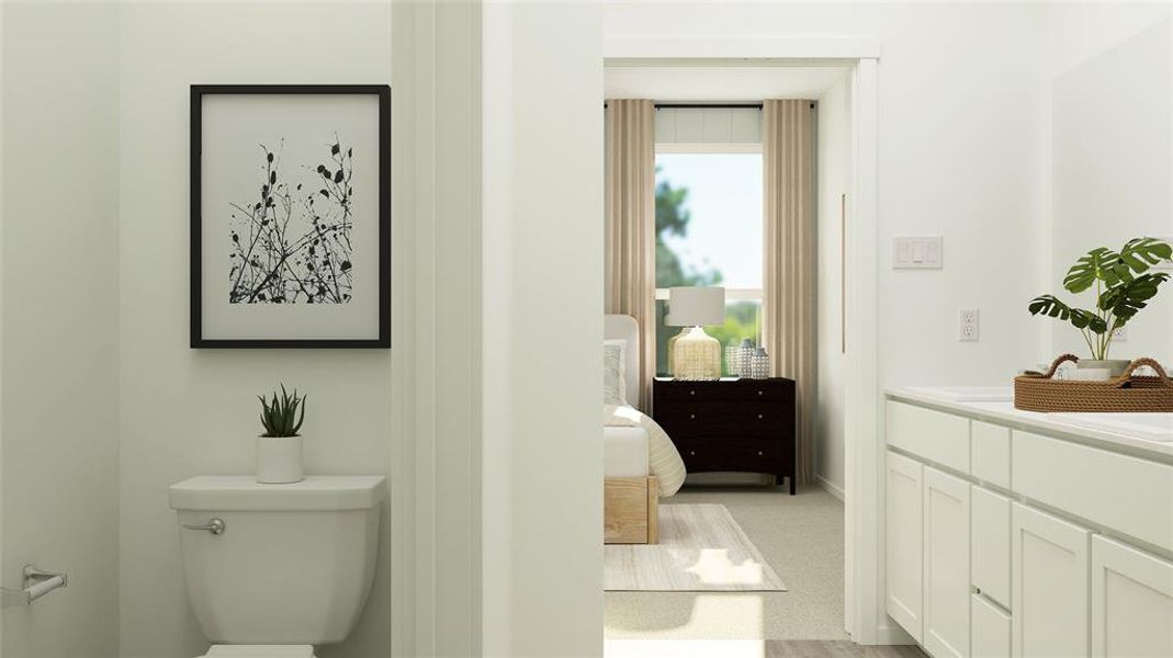 Bathroom with vanity and toilet