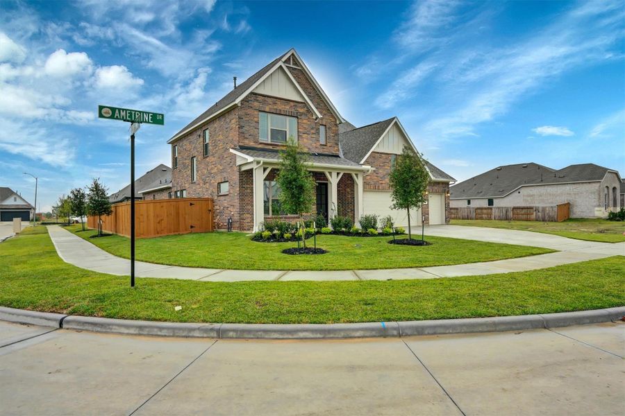 Front exterior of a new home in Canterra Creek  60', Iowa Colony, TX, highlighting curb appeal (Image 24).