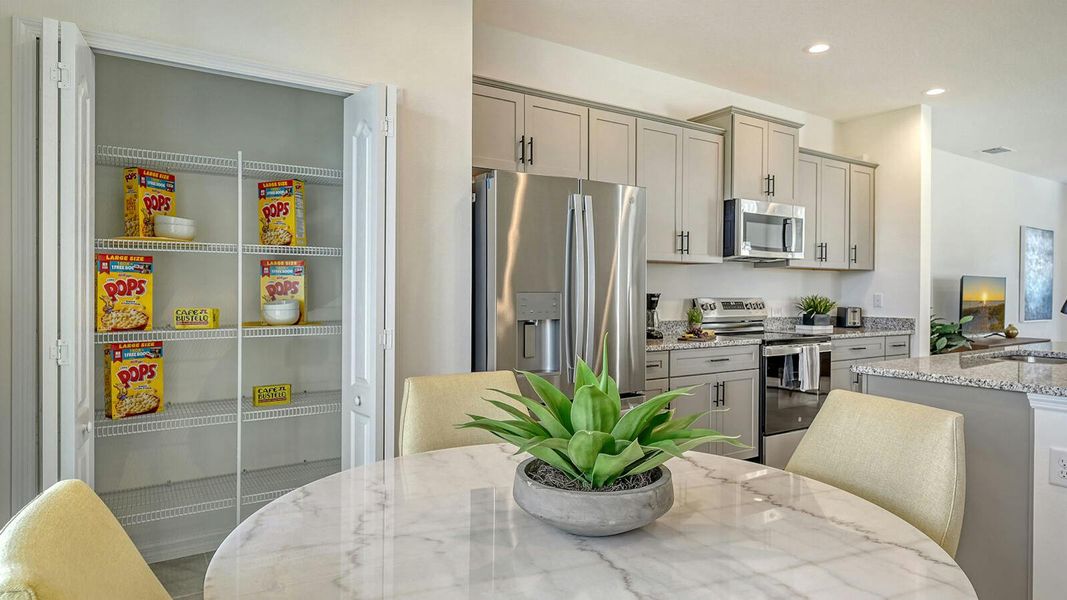 Furnished interior view inside a new home in Grand Park Real Estate and Homes for Sale in Sarasota, FL - Neal Communities, Sarasota (Image 19).