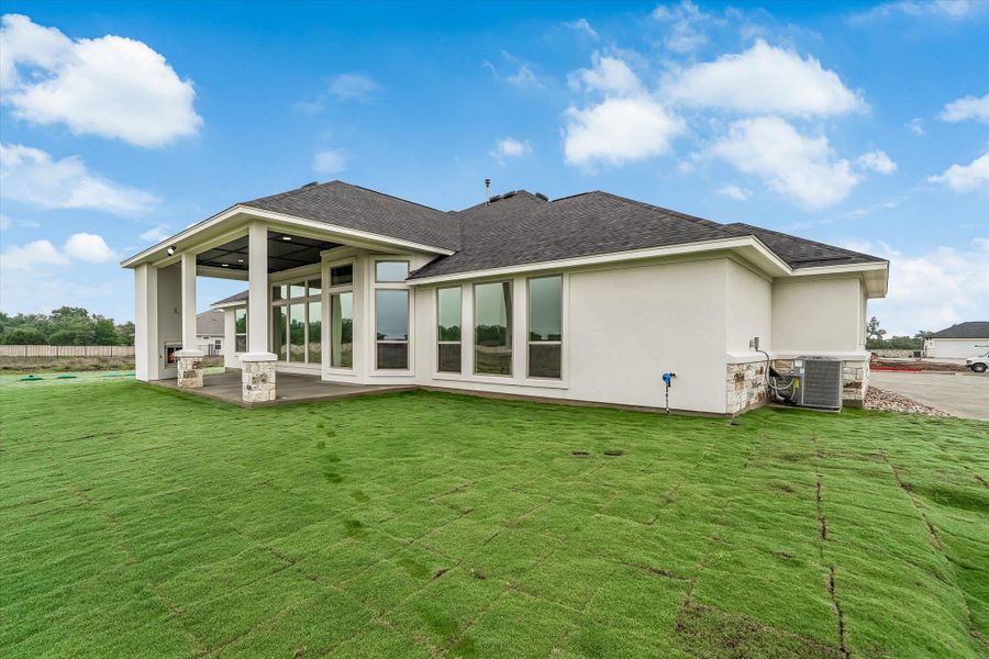 Exterior details and patio area of a home in Leander Estates, Leander (Image 10).