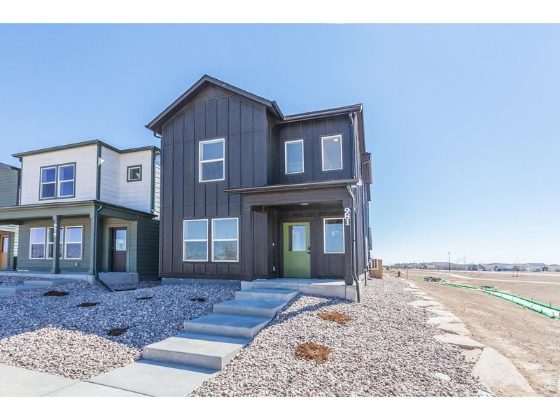 Front exterior of a new home in Prairie Song Story Collection - Single Family Homes, Windsor, CO, highlighting curb appeal (Image 23).