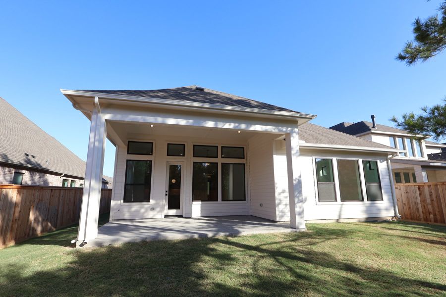 Exterior details and patio area of a home in Kresston, Magnolia (Image 3).