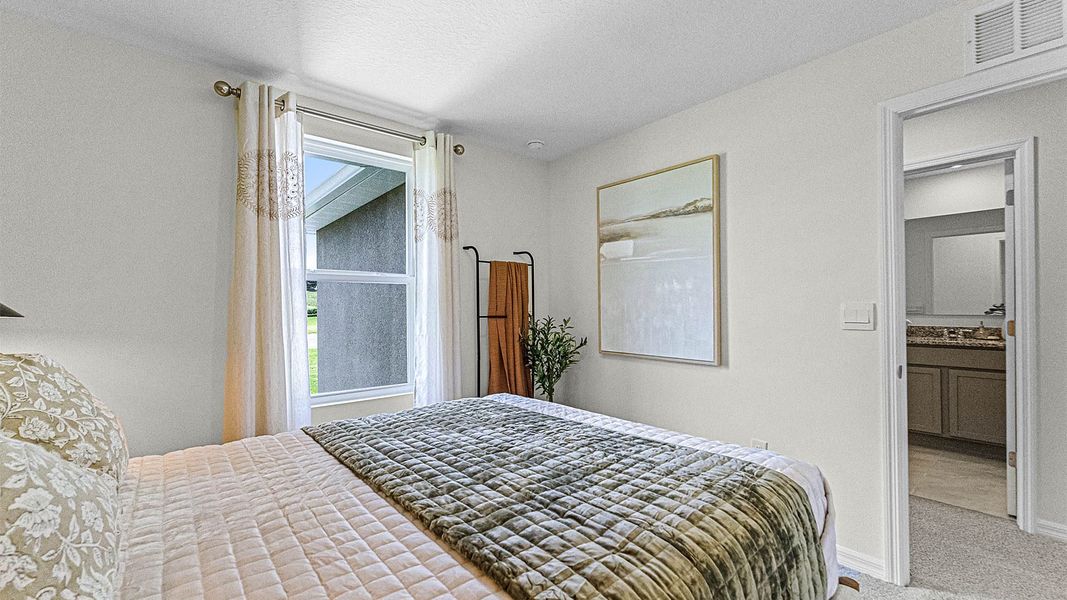 Furnished interior view inside a new home in Windrose, Apopka (Image 26).