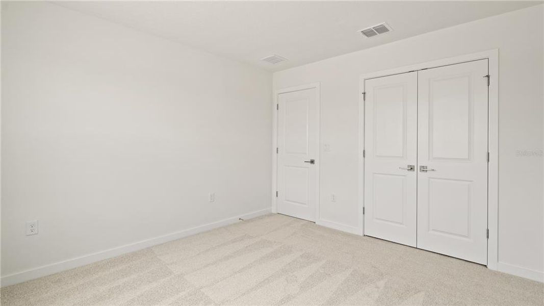 Spacious, unfurnished interior of a new home in Willowbrook North, Winter Haven (Image 32).