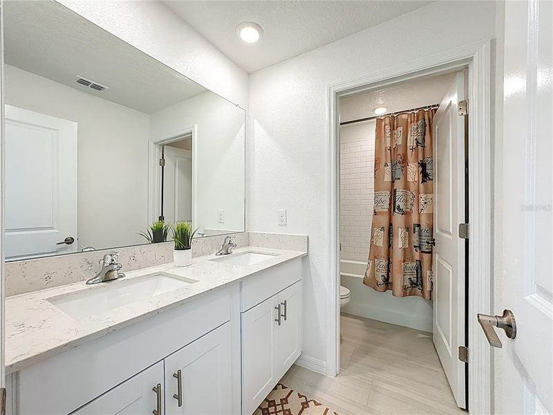 Furnished interior view inside a new home in Berry Bay: The Executives, Wimauma (Image 5).