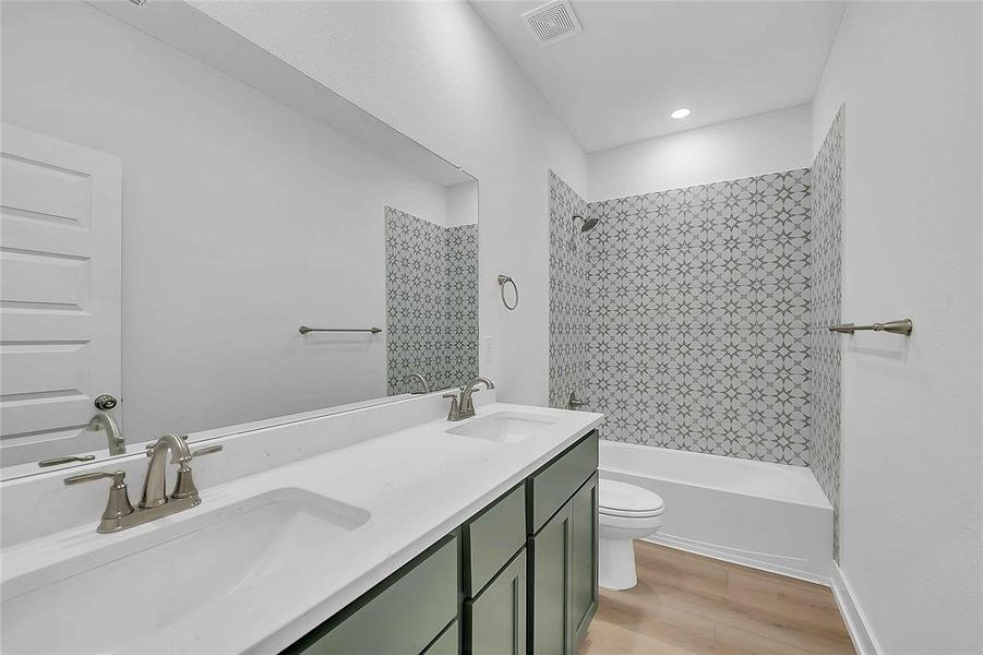 Please Note: These interior photos are not of the actual home but are of a completed one with a similar floor plan. Finishes, features, and layouts may vary.