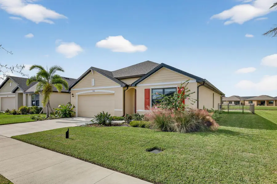 Front exterior of a new home in , Port St. Lucie, FL, highlighting curb appeal (Image 1). Front exterior of a new home in , Port St. Lucie, FL, highlighting curb appeal (Image 1).