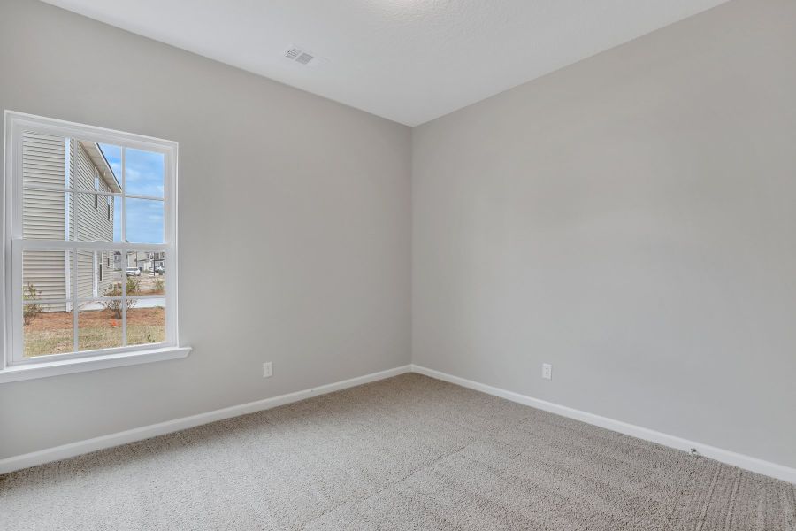 Representative unfurnished interior of a home built from the The Basswood by RTS Homes in Grand Reserve, Hinesville (Image 23). Representative unfurnished interior of a home built from the The Basswood by RTS Homes in Grand Reserve, Hinesville (Image 23).