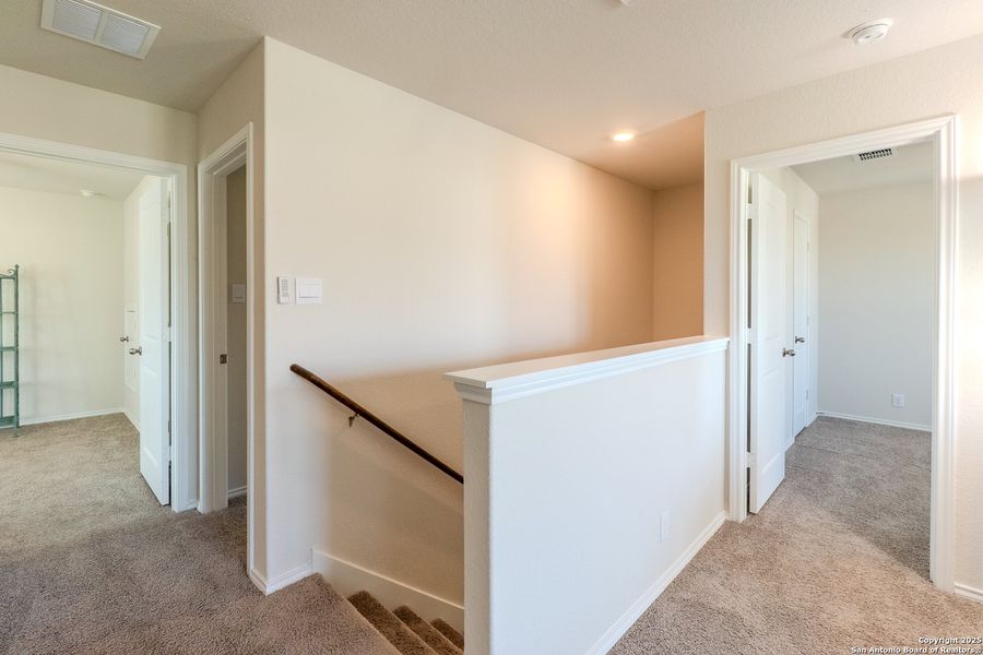Furnished interior view inside a new home in The Links at River Bend, Floresville (Image 12).