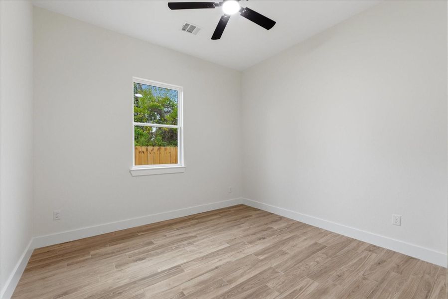 No carpet anywhere in sight! Bedrooms 3 & 4 offer tile flooring, spacious closets and a ceiling fan. No carpet anywhere in sight! Bedrooms 3 & 4 offer tile flooring, spacious closets and a ceiling fan.