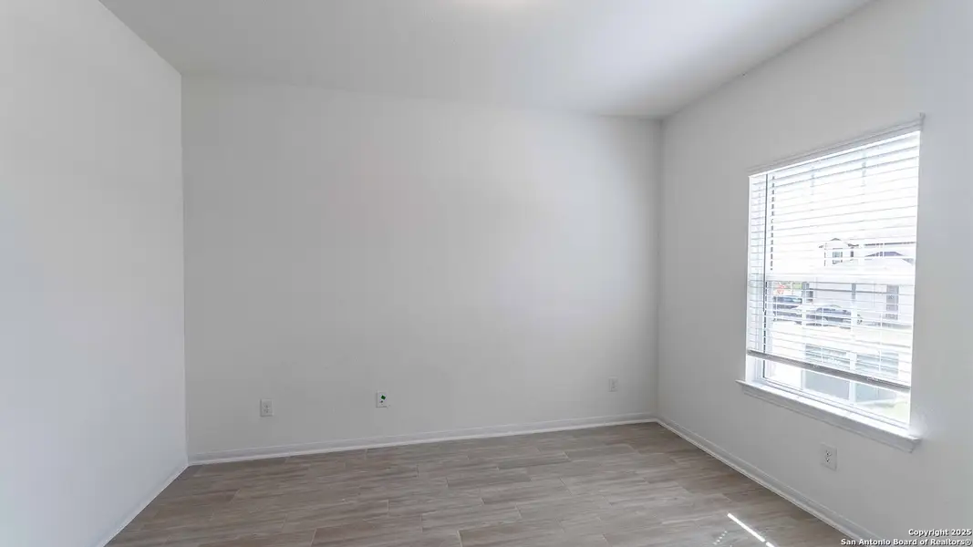 Spacious, unfurnished interior of a new home in Hunter's Ranch, San Antonio (Image 6).