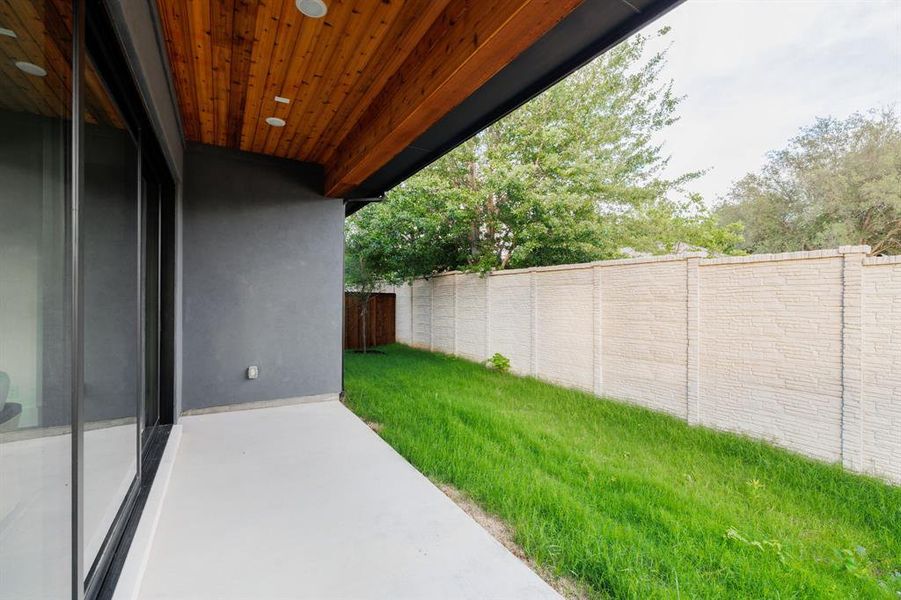 Exterior details and patio area of a home in Dove Station, Grapevine (Image 4).