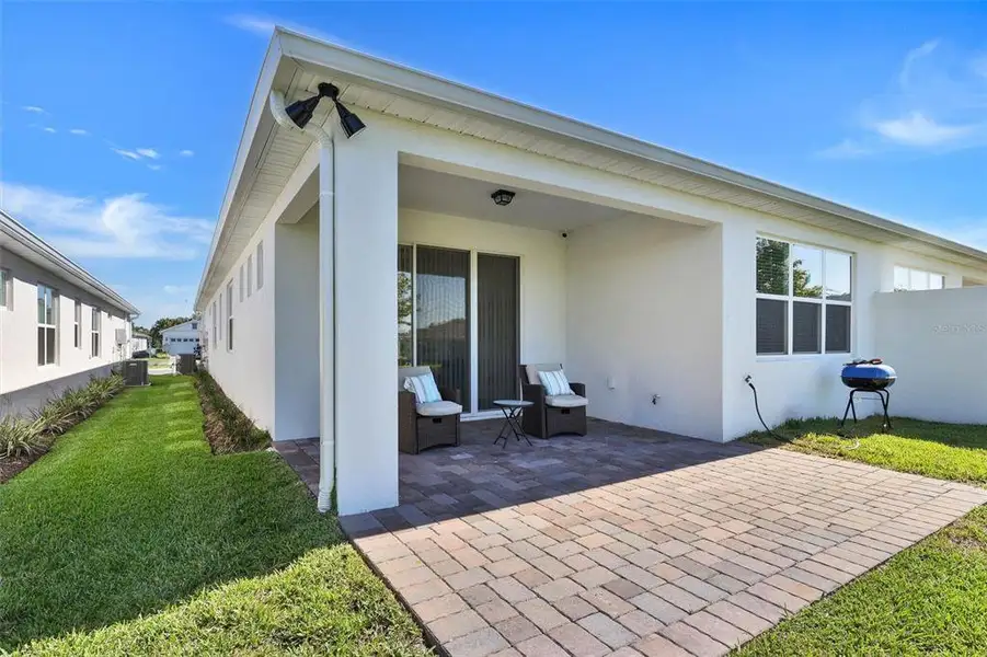 Exterior details and patio area of a home in , Winter Garden (Image 4). Exterior details and patio area of a home in , Winter Garden (Image 4).
