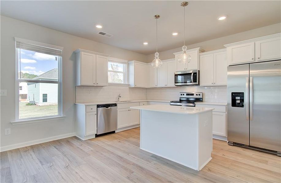 Furnished interior view inside a new home in Westminster, Covington (Image 8). Furnished interior view inside a new home in Westminster, Covington (Image 8).