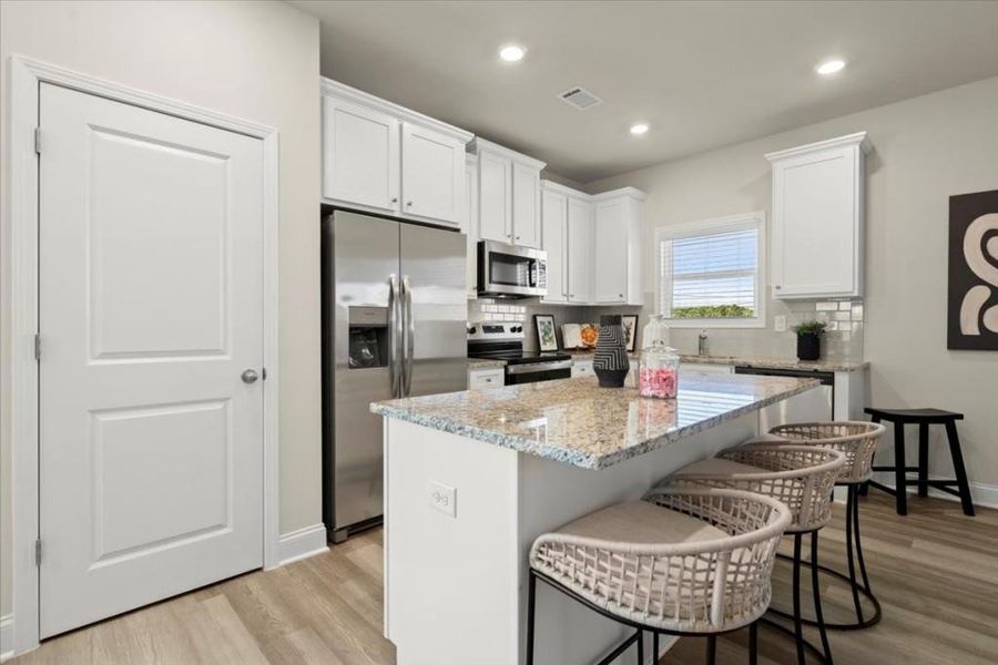 Furnished interior view inside a new home in , Loganville (Image 3).