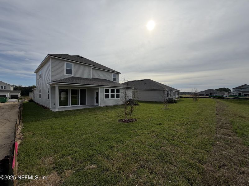 Exterior details and patio area of a home in , Flagler Beach (Image 4).