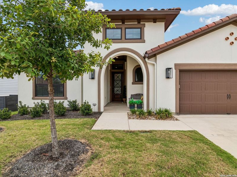 Front exterior of a new home in Kissing Tree, San Marcos, TX, highlighting curb appeal (Image 1). Front exterior of a new home in Kissing Tree, San Marcos, TX, highlighting curb appeal (Image 1).