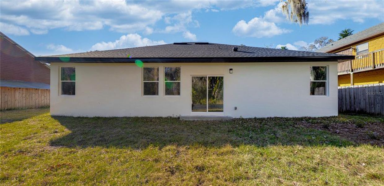 Exterior details and patio area of a home in , Deltona (Image 25).