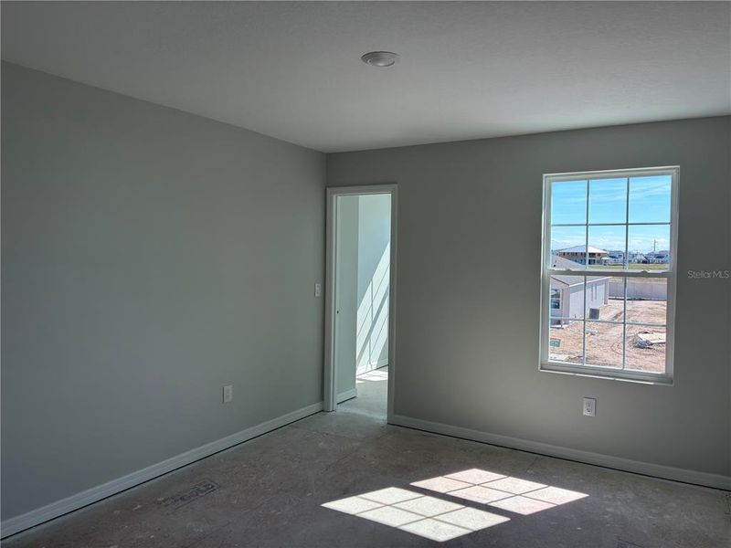 Spacious, unfurnished interior of a new home in Oakfield Trails, Parrish (Image 12).