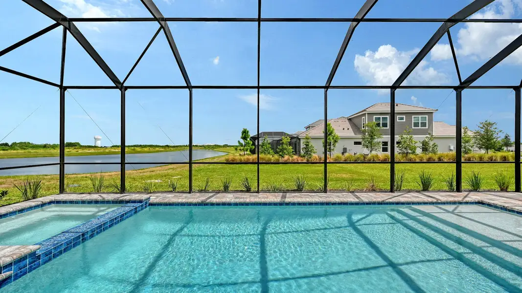 Exterior details and patio area of a home in Palm Grove Real Estate and Homes for Sale in Lakewood Ranch, FL - Neal Communities, Bradenton (Image 18).