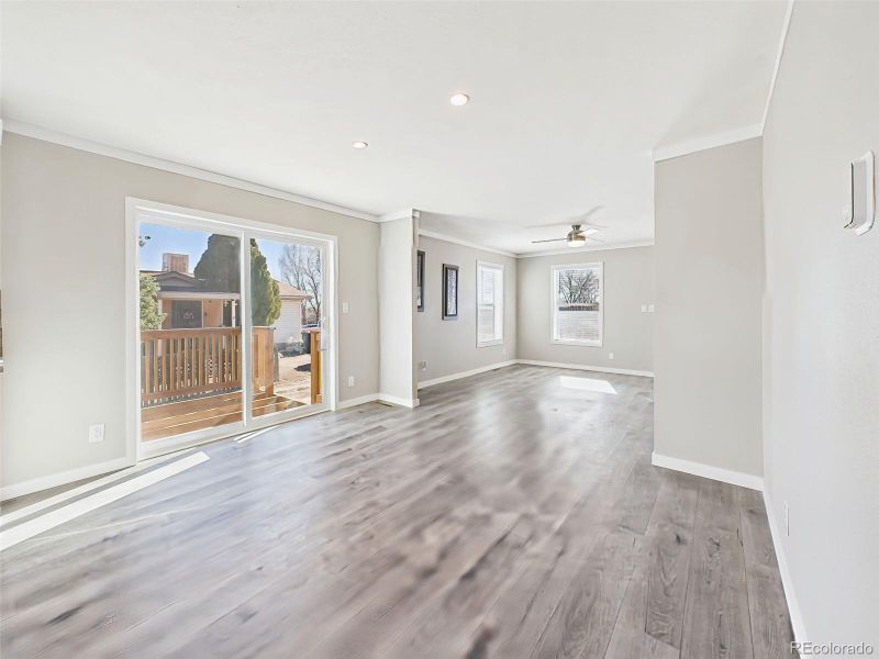 Unstaged Dining & Living Areas – A flexible open-concept area with neutral finishes and backyard access, ready to be styled to suit your needs.