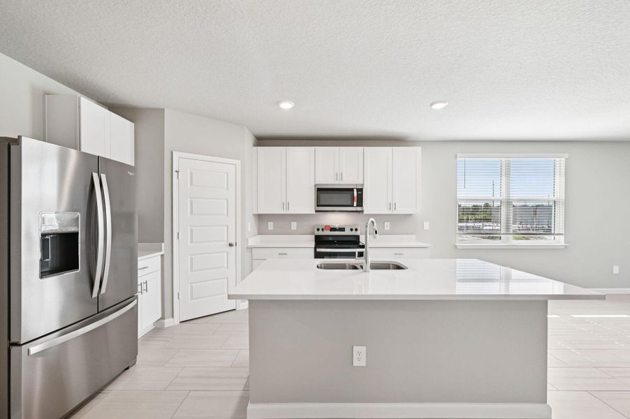 Furnished interior view inside a new home in Hampton Park - Classic Series, Vero Beach (Image 14). Furnished interior view inside a new home in Hampton Park - Classic Series, Vero Beach (Image 14).