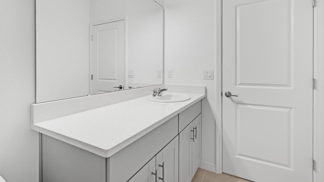 Representative furnished interior of a home built from the Ambrosia by Taylor Morrison in Aden South at Westview, Kissimmee (Image 11).