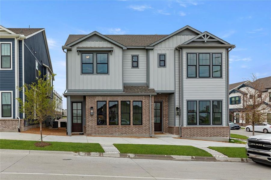 Front exterior of a new home in Collin Creek, Plano, TX, highlighting curb appeal (Image 17).