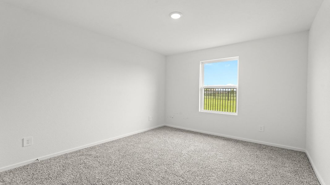 Spacious, unfurnished interior of a new home in Sunterra, Katy (Image 13).