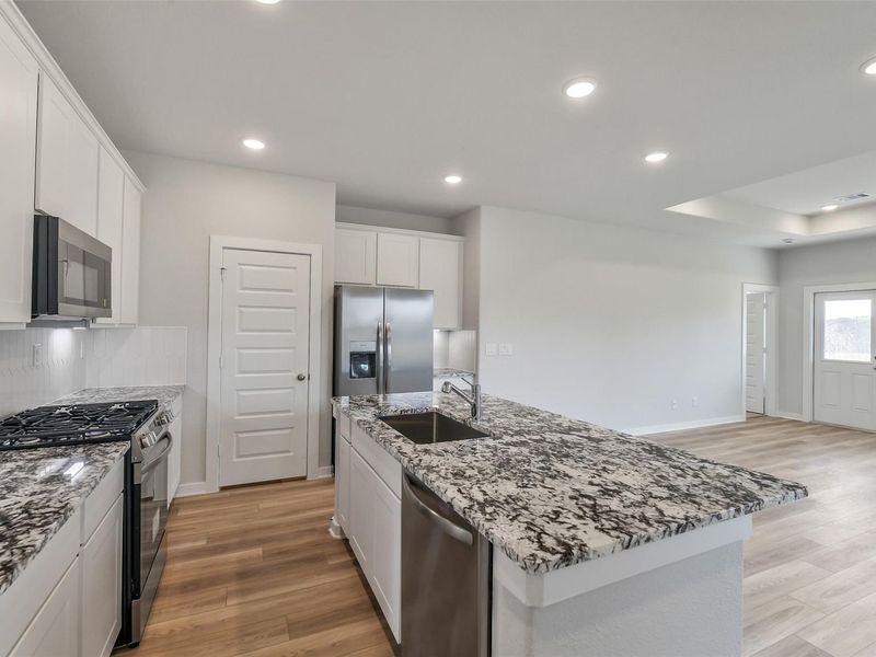 Furnished interior view inside a new home in Windmill Estates, Magnolia (Image 9).