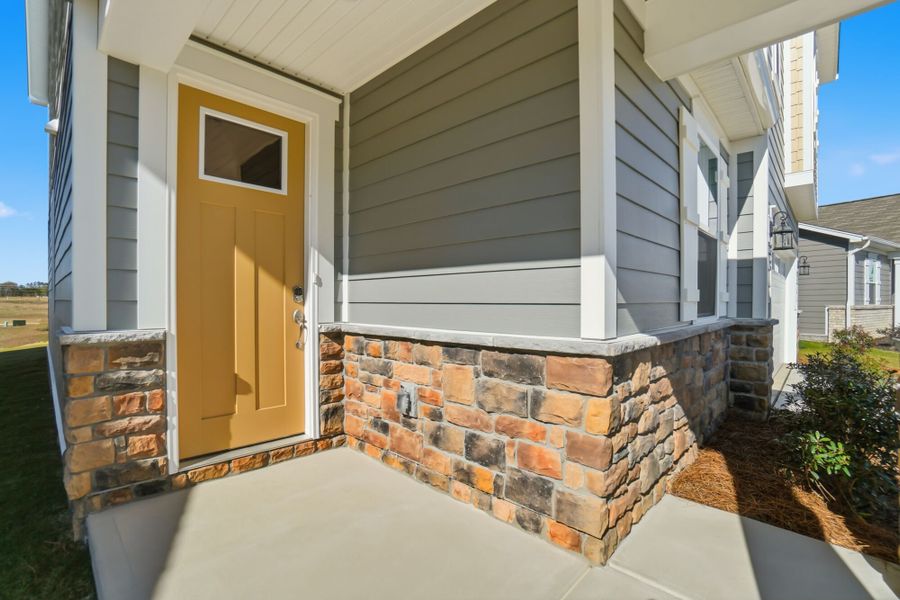 Exterior details and patio area of a home in Waxhaw Landing, Monroe (Image 3). Exterior details and patio area of a home in Waxhaw Landing, Monroe (Image 3).