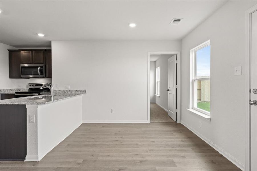 Furnished interior view inside a new home in Retreat at Fossil Creek, Fort Worth (Image 4). Furnished interior view inside a new home in Retreat at Fossil Creek, Fort Worth (Image 4).