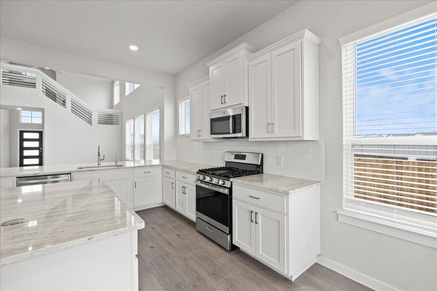 Furnished interior view inside a new home in Village at Three Oaks, Seguin (Image 7). Furnished interior view inside a new home in Village at Three Oaks, Seguin (Image 7).