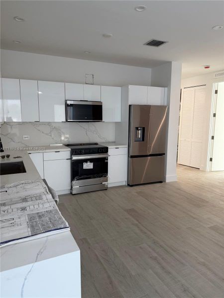 Furnished interior view inside a new home in , Hallandale Beach (Image 5).