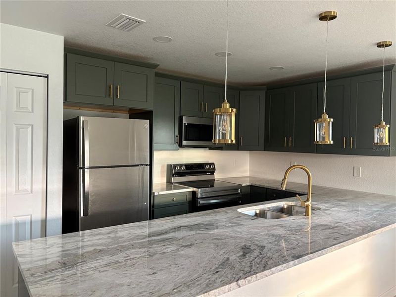 Furnished interior view inside a new home in , Englewood (Image 10). Furnished interior view inside a new home in , Englewood (Image 10).