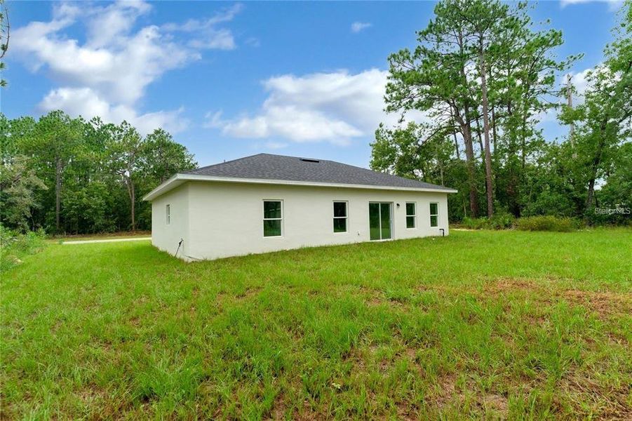 Exterior details and patio area of a home in , Ocala (Image 17).