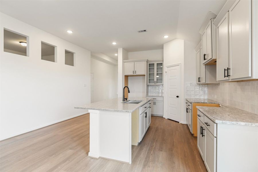 Furnished interior view inside a new home in Creekhaven, Iowa Colony (Image 15).