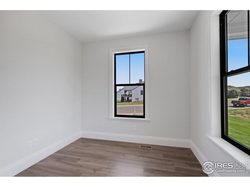 The front office--the engineered hardwood flooring runs throughout the home