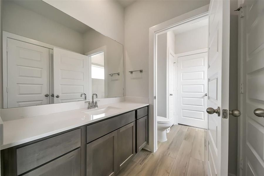 Furnished interior view inside a new home in Sunterra, Katy (Image 43).