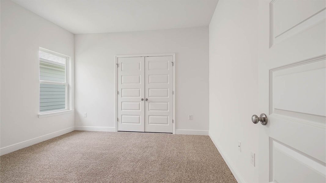 Representative unfurnished interior of a home built from the Kennedy by D.R. Horton in Bayside at Ward Creek, Panama City Beach (Image 31).
