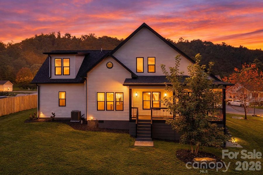 Front exterior of a new home in , Hendersonville, NC, highlighting curb appeal (Image 18).