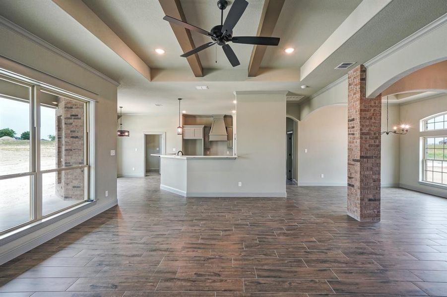 Bar top peninsula, with open floorplan for entertaining.