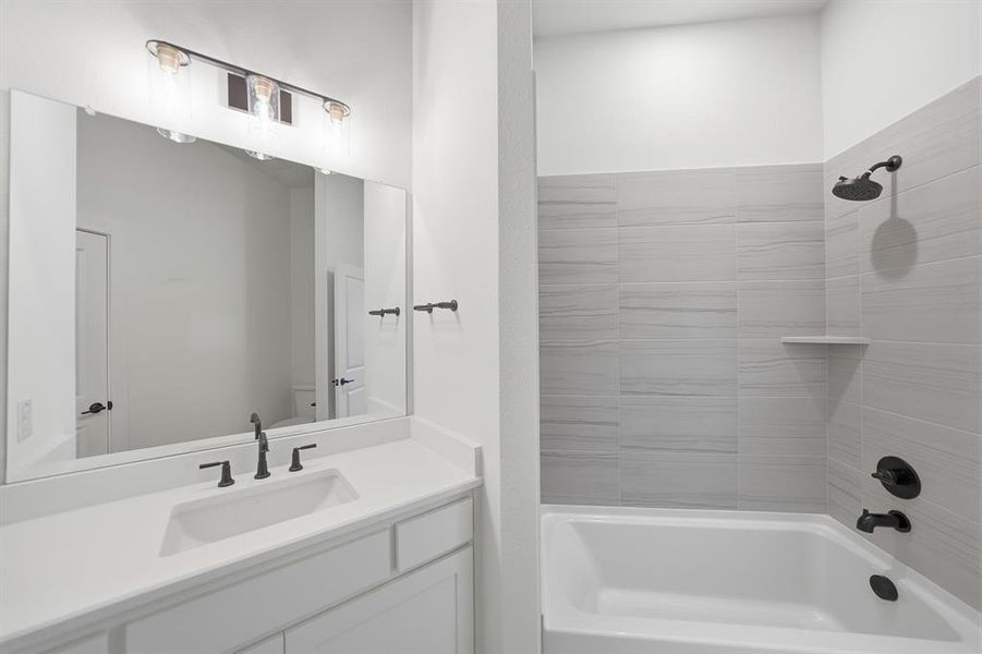 Furnished interior view inside a new home in Light Farms Graham/Reagan, Celina (Image 19).